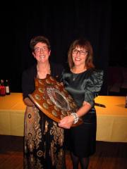 Kathy presents She with the Vincent Shield