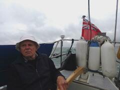 Barge Master at the helm