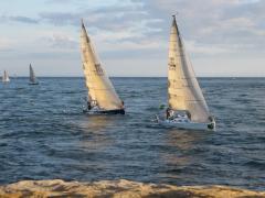 Yachts crawling against the tide at Portland Bill