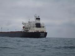 This is the end you can be close to - a Greek freighter passes close ahead