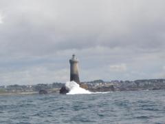 Gateway to better weather - lighthouse at the top of the Chenal du Four in calm weather