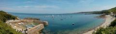 Panoramic view Port Racine and the Anse St. Martin - note the giant container ship on the horizon..