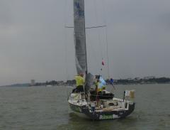 The finishing touches - Thierry checks his patent reefing-line system