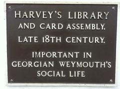 Plaque outside John Harvey's Assembly Rooms on the Esplanade