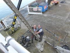 Centenary signs come down